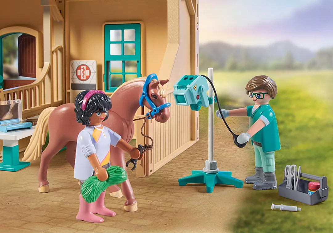 Horses of Waterfall | Riding Therapy & Vet Practice with vet examining horse and assistant holding hay in stable.