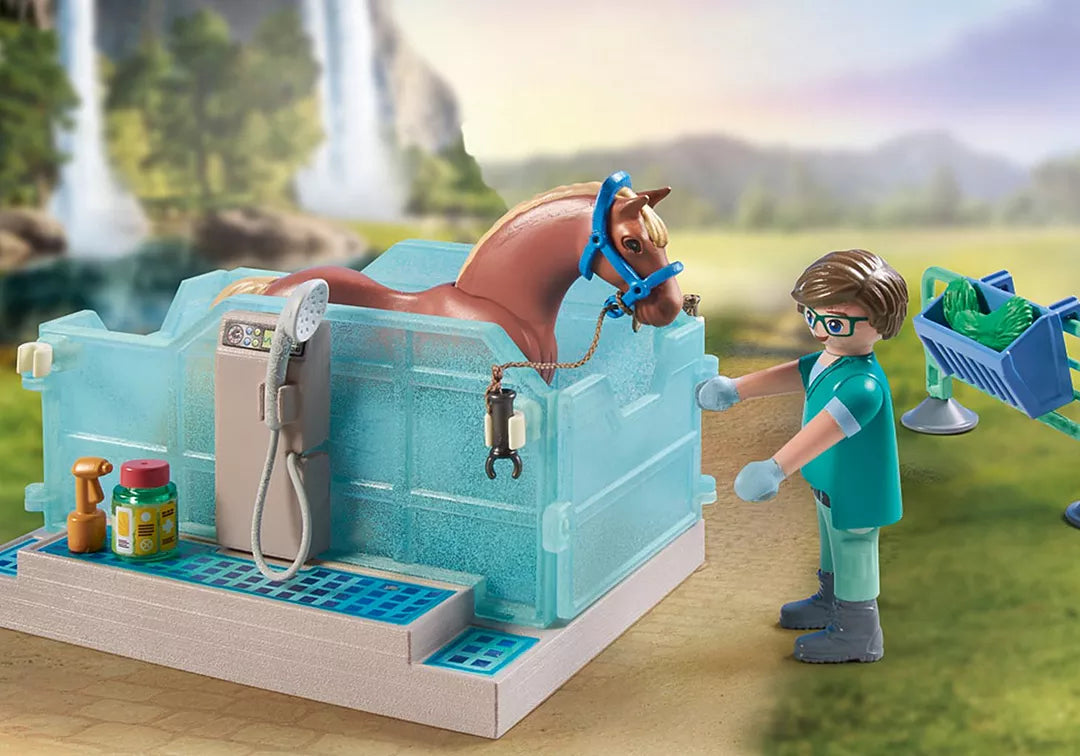 Horses of Waterfall | Riding Therapy & Vet Practice with vet Phil treating horse Zora in a clear aqua trainer pool.