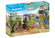 Horses of Waterfall | Jumping Arena & Zoe & Blaze Playmobil set with horse, rider, and jumping obstacles outdoors.