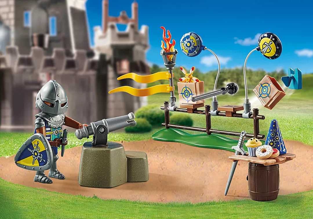 Novelmore | Knight's Birthday playset with knight figure, cannon shooting game, pastries, and castle backdrop for imaginative play.