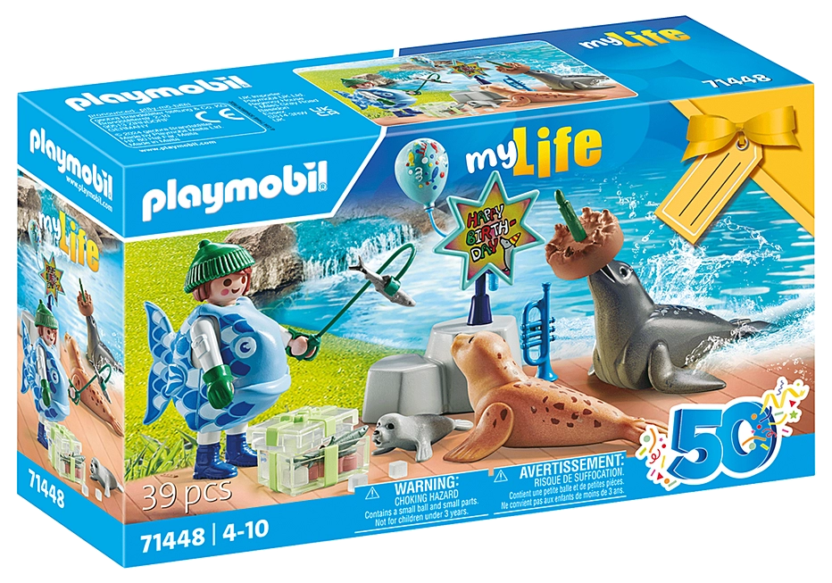 My Life | Keeper with Animals playset featuring seals, a caretaker in fish costume, trumpet, and birthday cake balancing sea lion.