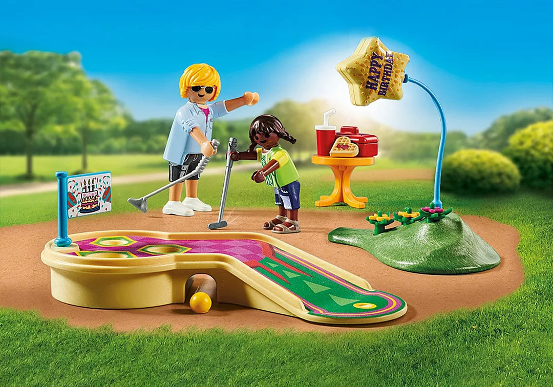 My Life | Mini Golf set with two figures playing on a colorful miniature golf course and birthday decorations outdoors.