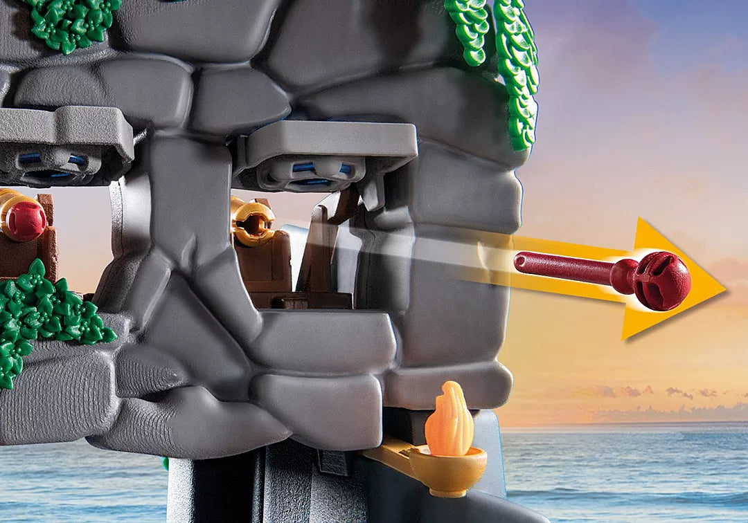 Pirates | Skull Island playset showing Skull Island cannon firing at sunset for thrilling pirate adventures.