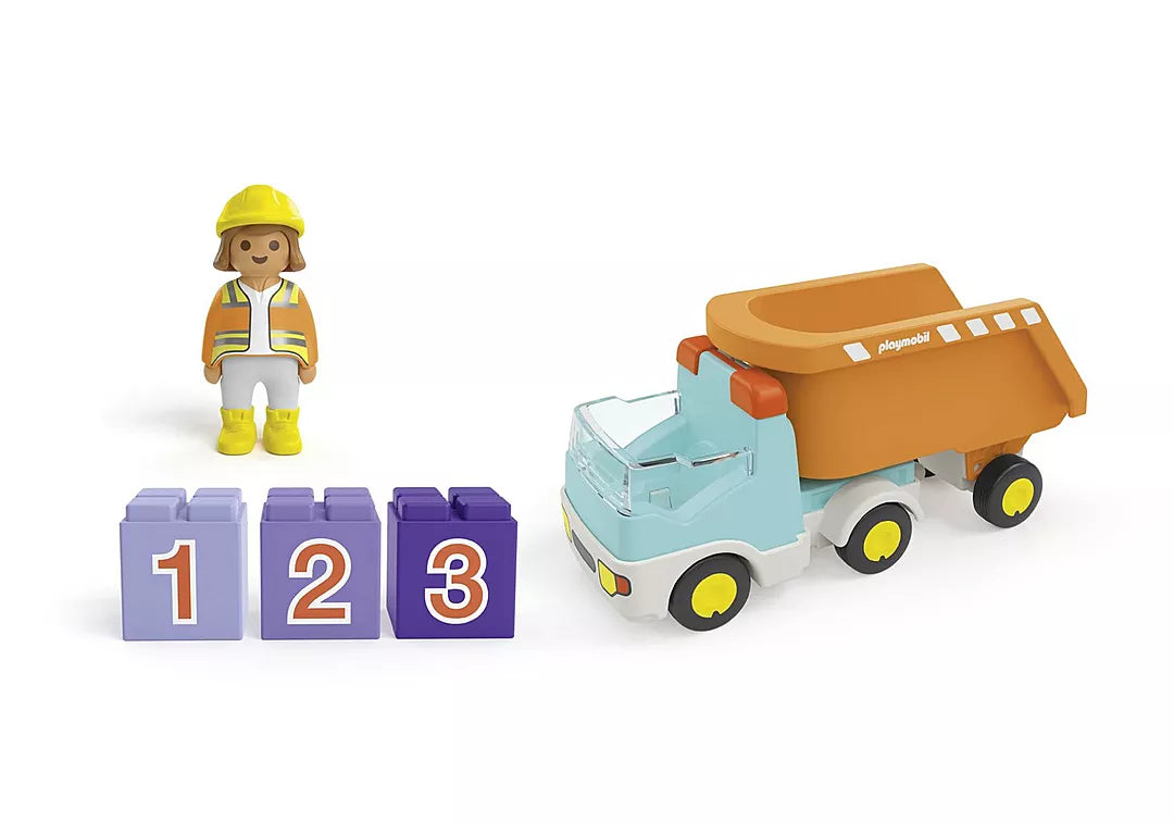 Junior Dump Truck toy with construction worker figure and three numbered stackable stones for learning and play.