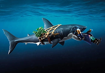 Pirates | Giant Shark with Pirate toy featuring a giant shark with an open mouth and a pirate figure riding it underwater.