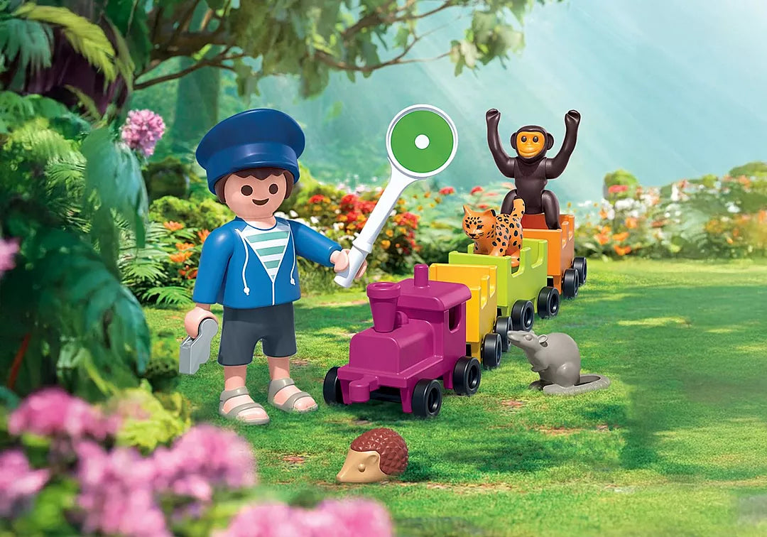 Animals & Friends | Train Ride toy train with animal figures and a smiling conductor in a colorful garden