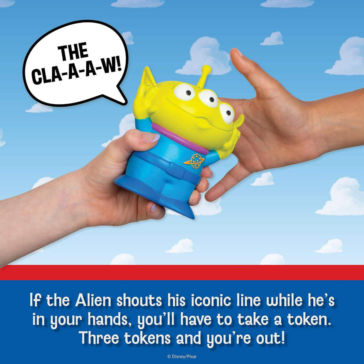 Toy Story Alien Game featuring a colorful three eyed alien toy held in two hands