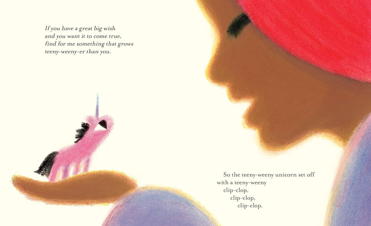 Close-up of a child holding a tiny pink unicorn in their hand from Teeny-Weeny Unicorn's Great Big Wish.