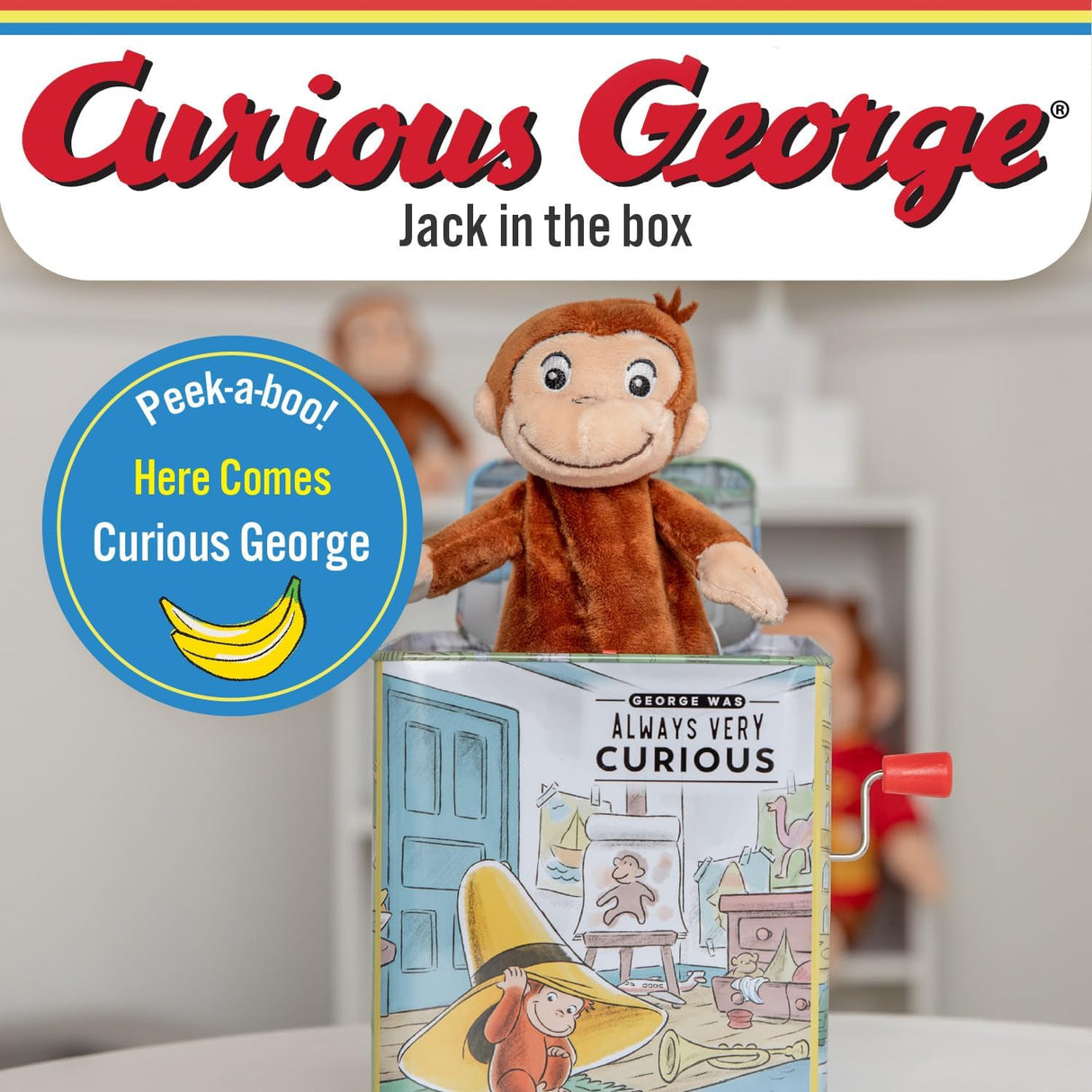 Curious George | Jack in the Box toy with plush monkey popping out of colorful illustrated box for infants.
