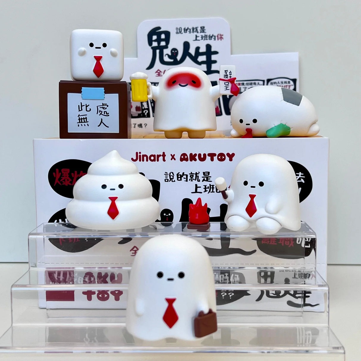 Set of six cute Ghost Life Blind Box figurines by JIN-ART Japan displayed on clear acrylic stands with Japanese designs.