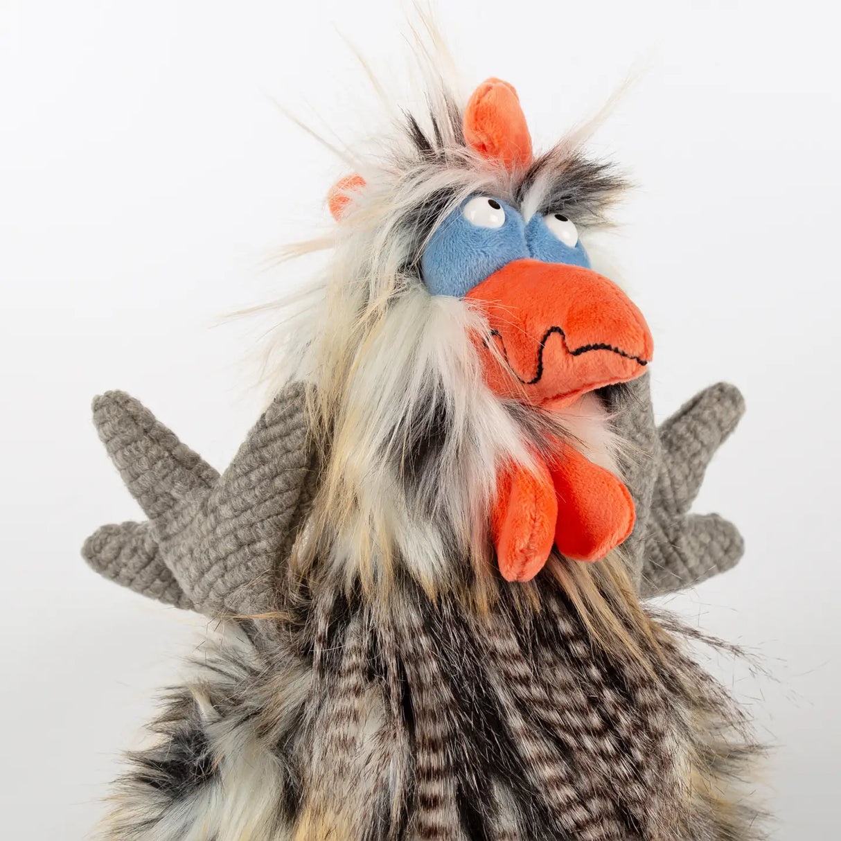 Chicken Tour de Poule plush toy with quirky design, colorful feathers, and expressive charming squint, perfect for kids 3+ years.