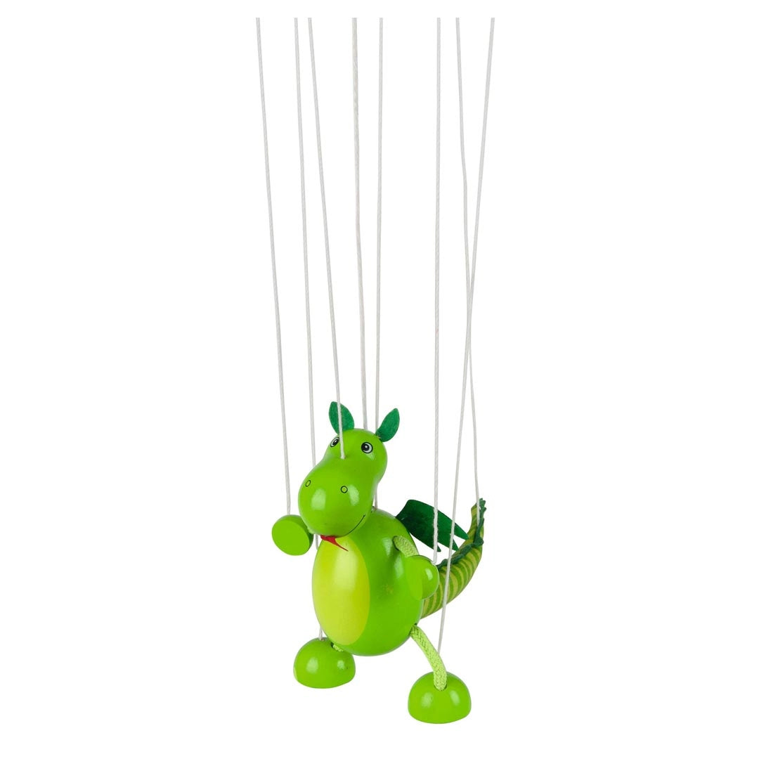 Green wooden dragon marionette puppet with wings and flexible limbs hanging by white strings