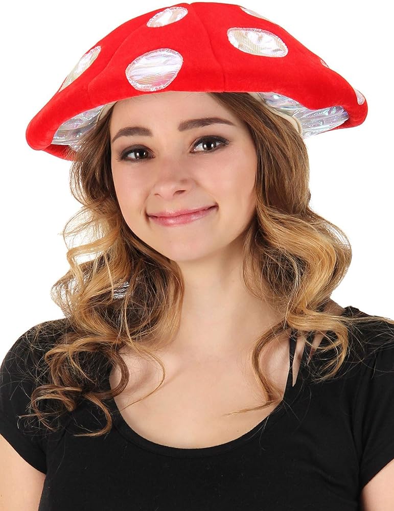 Young woman wearing a red and white Mushroom Lumen Hat with glowing LED lights and adjustable size.