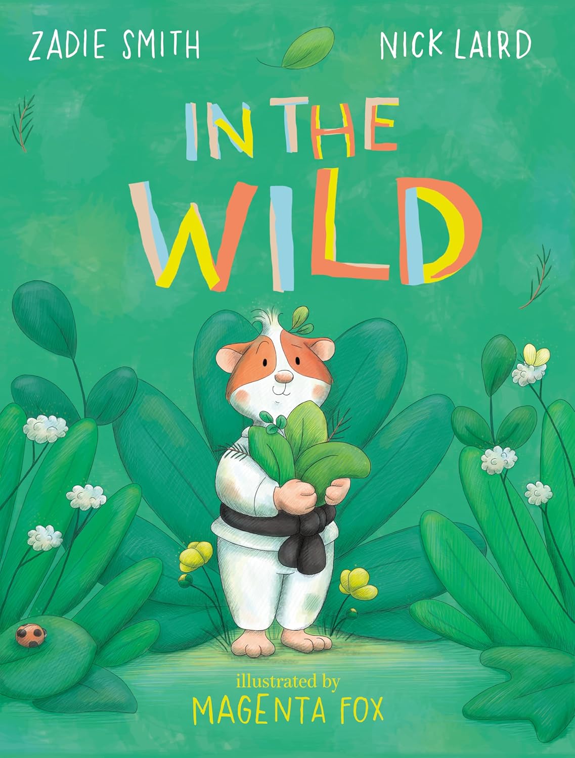 In the Wild book cover with judo-suit-wearing guinea pig Maud holding green leaves in a vibrant forest setting.
