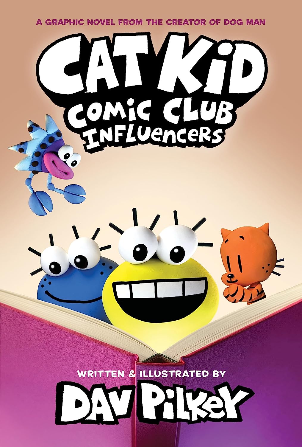 Cover of Cat Kid Comic Club #5: Influencers featuring colorful cartoon characters above an open purple book.