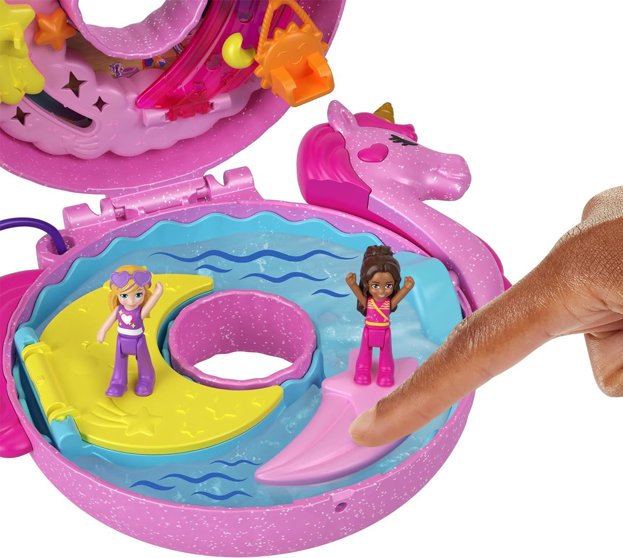 Polly Pocket Sparkle Cove Unicorn Floatie Compact with colorful water play and two micro dolls inside a pink unicorn-shaped case.