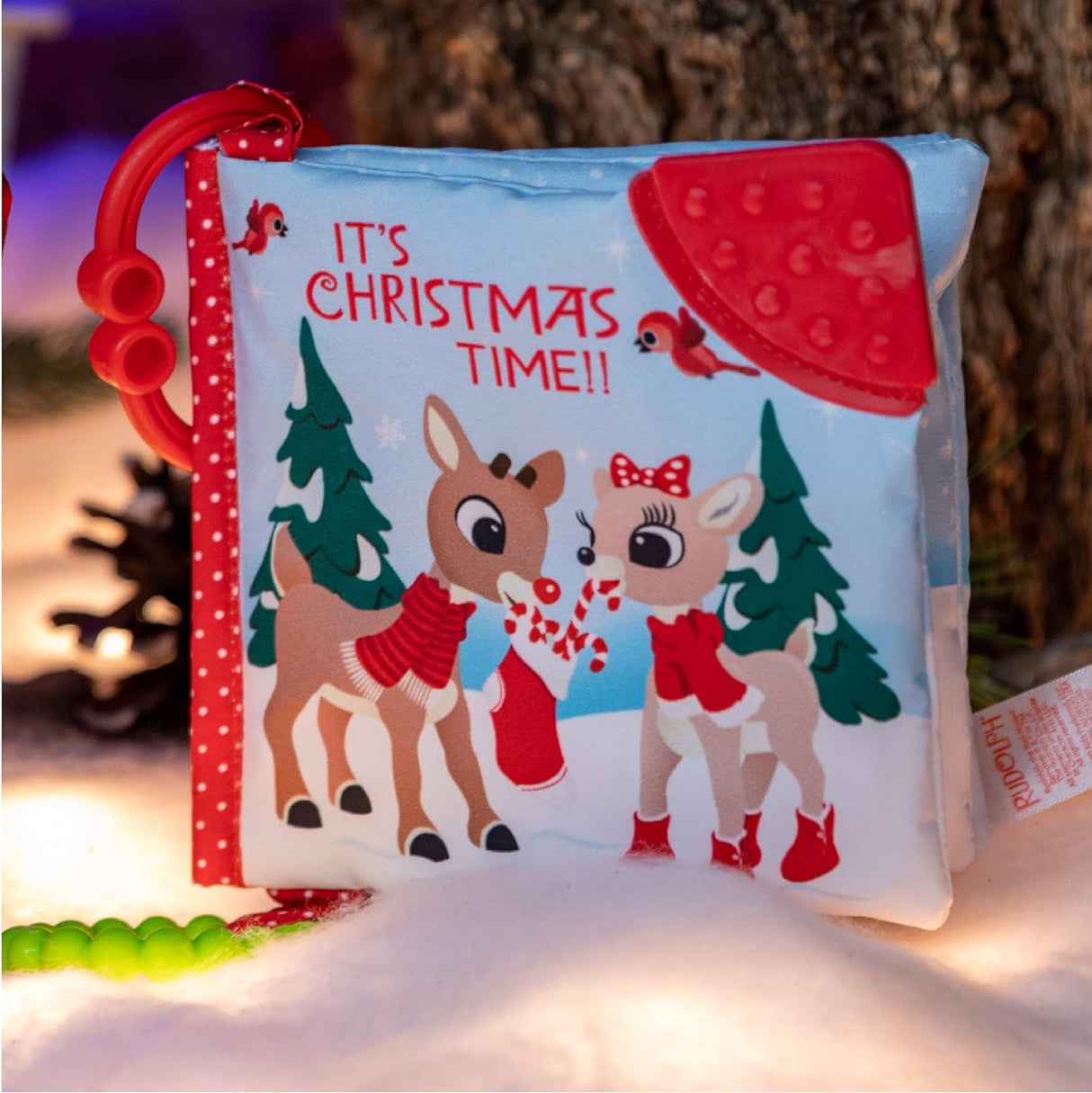 Rudolph | Soft Book featuring soft sensory pages, teether, Christmas design, and on-the-go clip for babies.