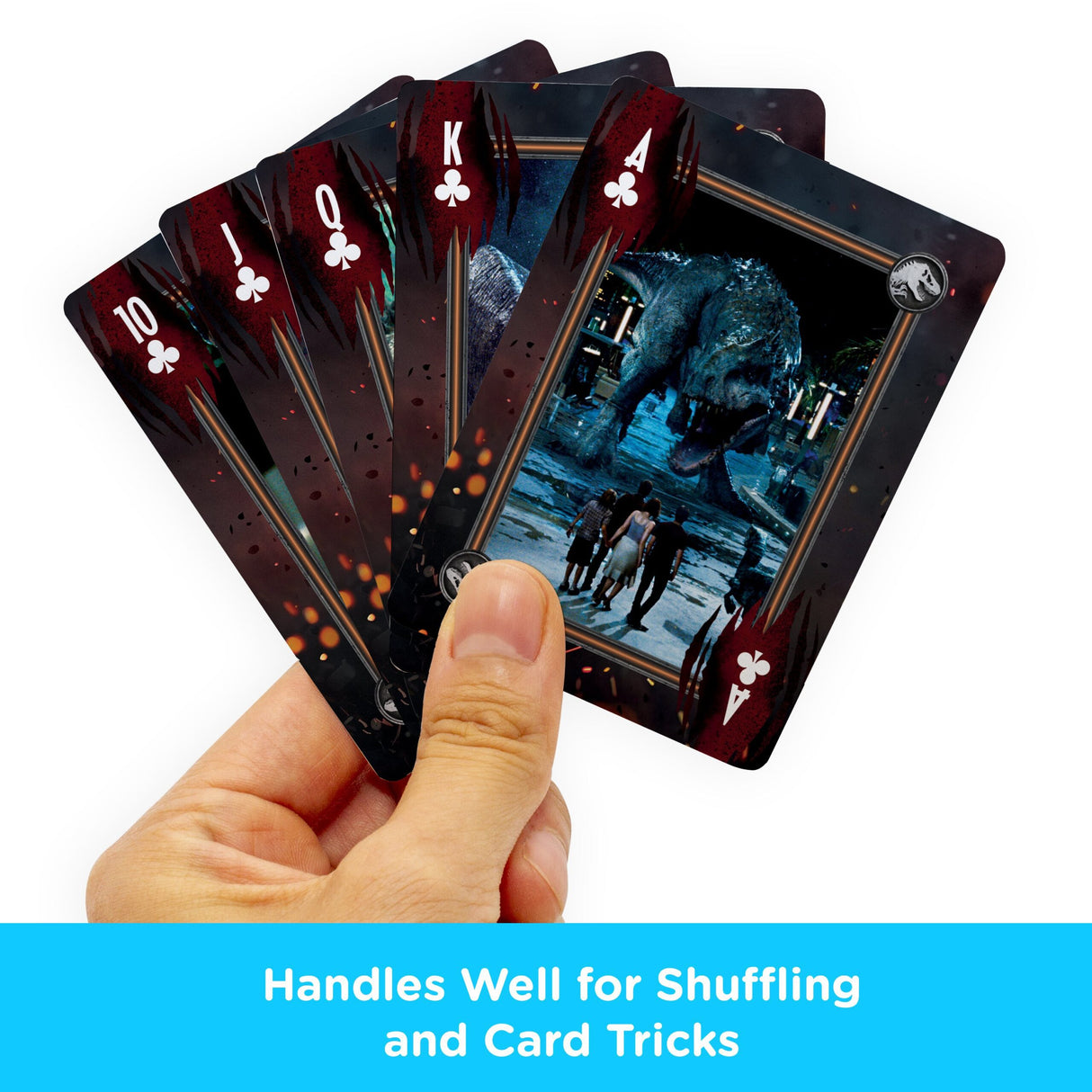 Hand holding Jurassic World Playing Cards featuring T-Rex and characters, perfect for family game nights.