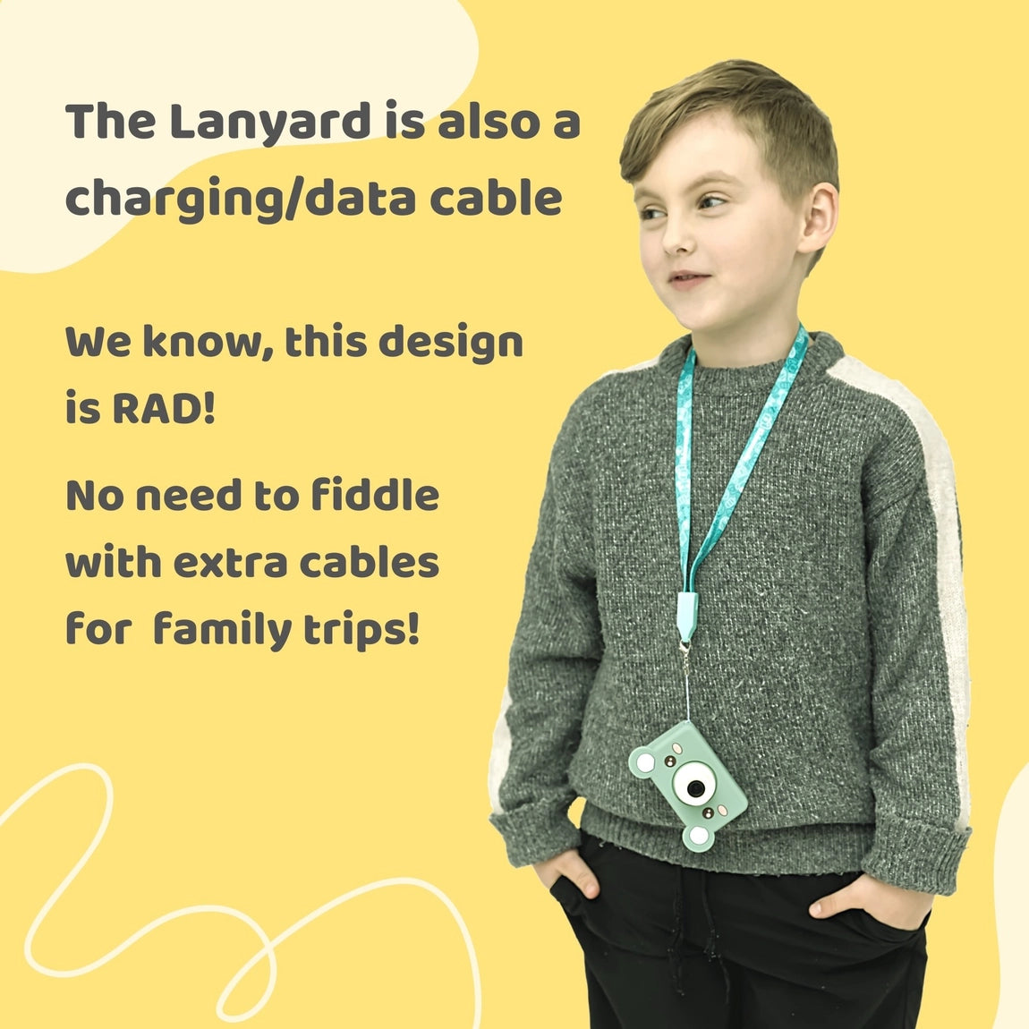 Digital Camera Model C | Mikayo the Bear shown worn by child with teal charging lanyard and bear-shaped silicone case.