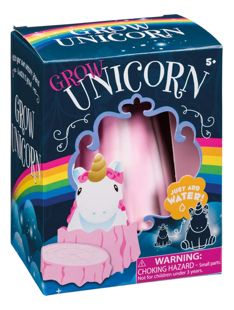 Grow Unicorn water-grow toy packaging with pink tree stump and unicorn visible through star-shaped window.