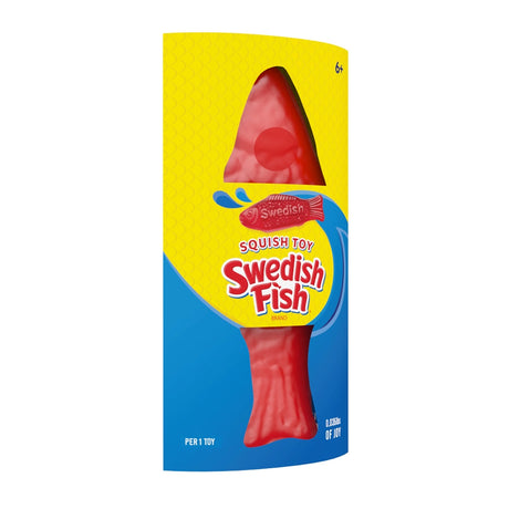 Squishy Candy | Swedish Fish stress-relief toy shaped like a red candy fish in yellow and blue packaging.