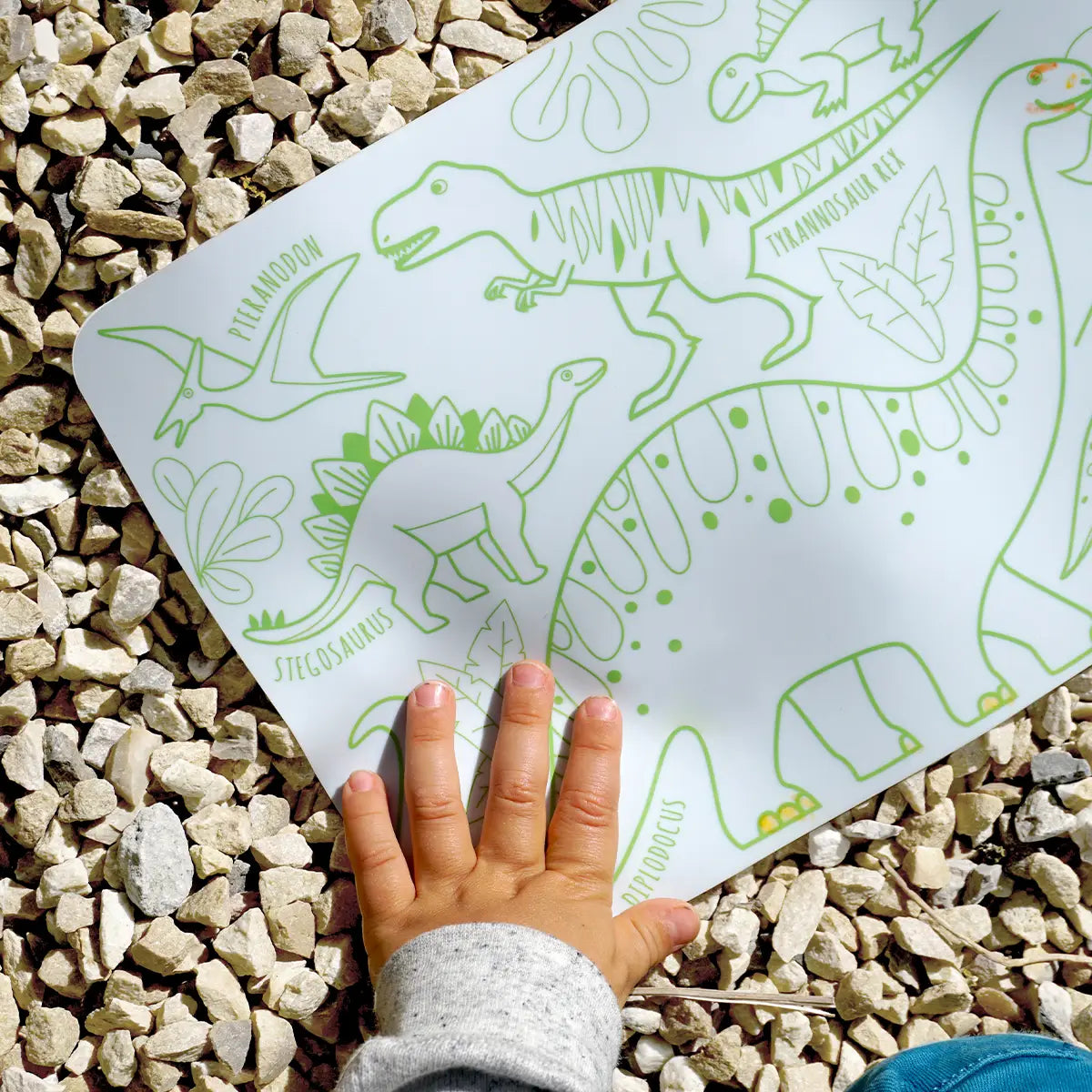 Mini Play Mat Dino reversible silicone drawing mat with dinosaur designs, perfect for kids on the go aged 3 and up.