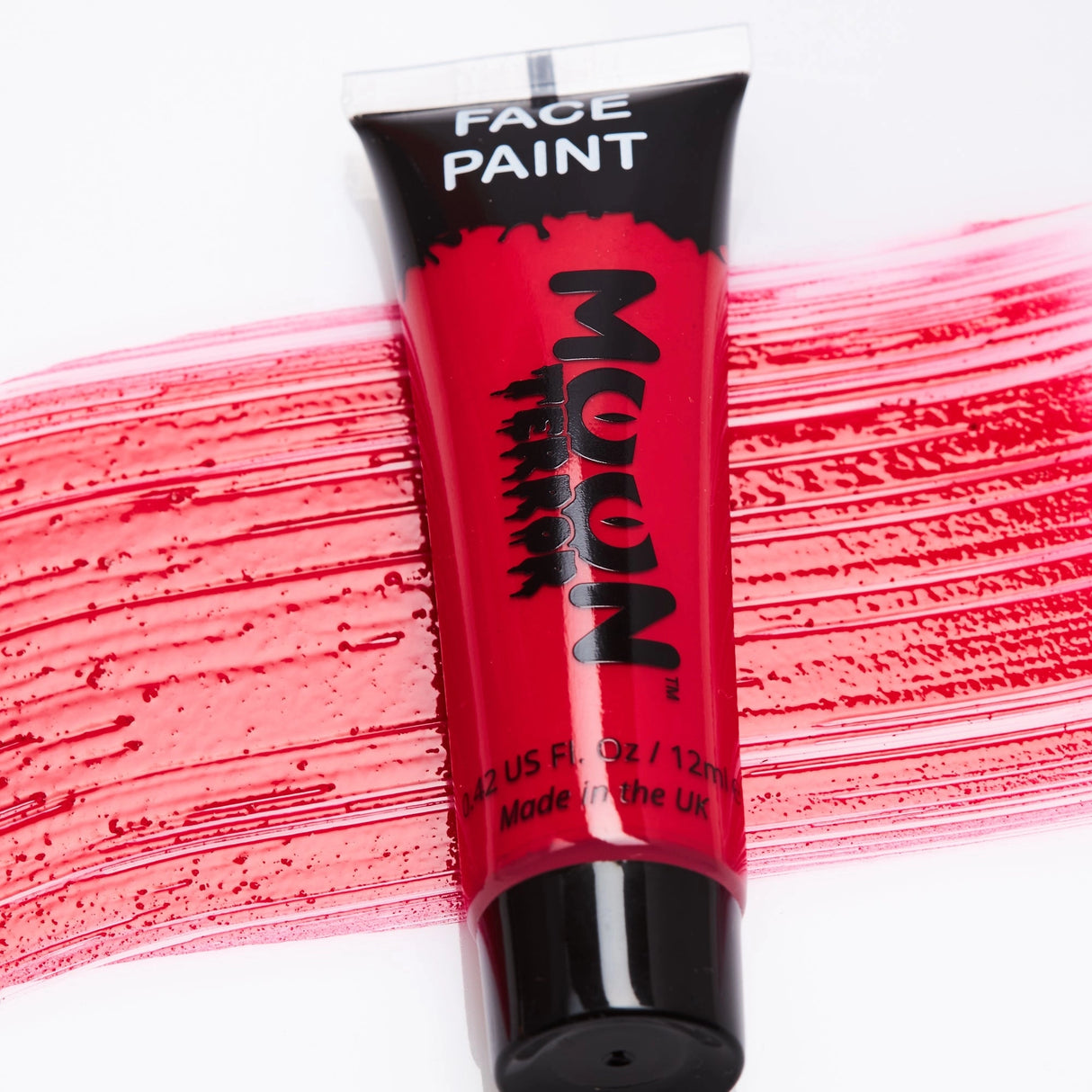 Face & Body Paints | Halloween red water-based face paint tube with smooth streak on white background, 12ml UK made.