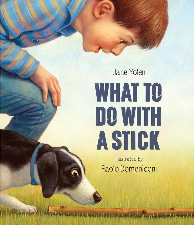 Cover of What to Do With a Stick showing a boy and dog intently looking at a stick in the grass.