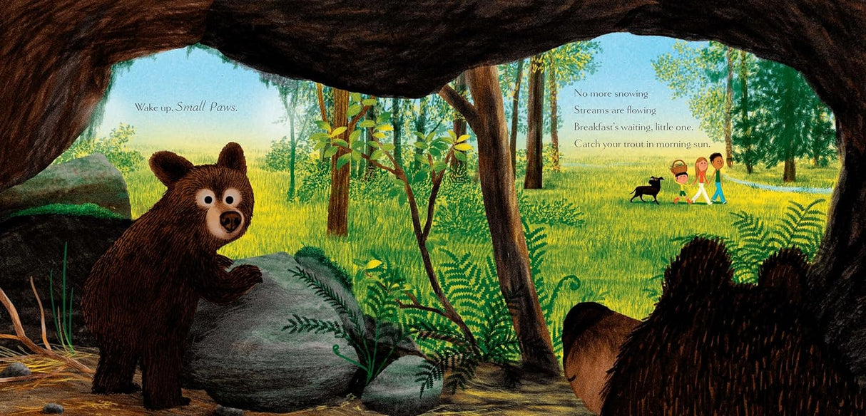 Wake Up, Woodlands book illustration showing a bear cub and forest animals greeting a bright spring morning.