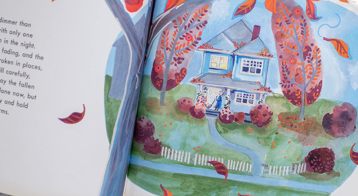 The Lantern House showing a charming illustrated home surrounded by autumn trees and falling leaves.