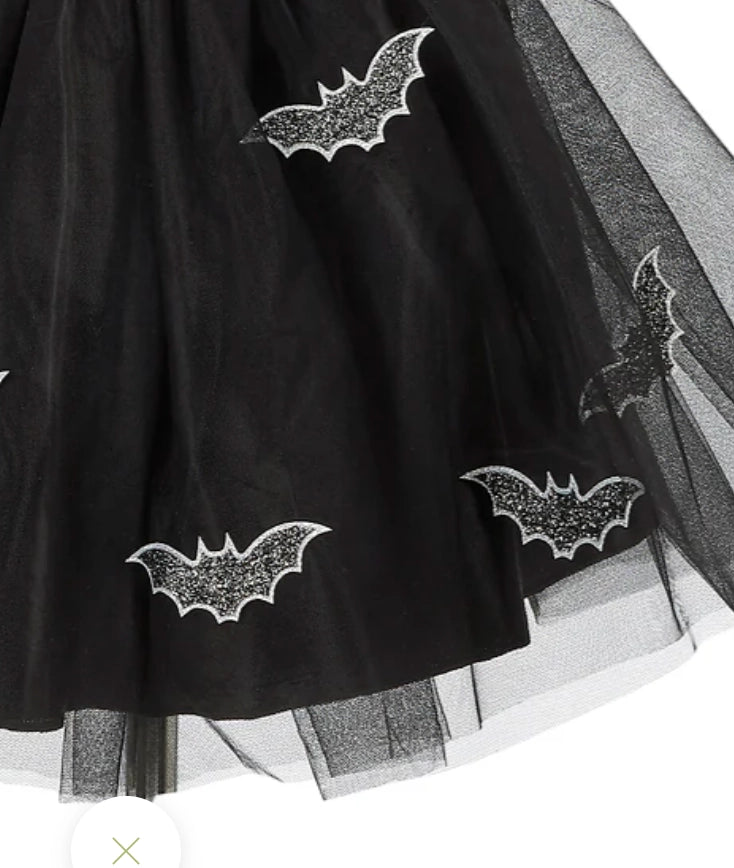 Black tulle skirt for kids with glittery bat appliques and an elastic waistband for easy wear and twirling fun.