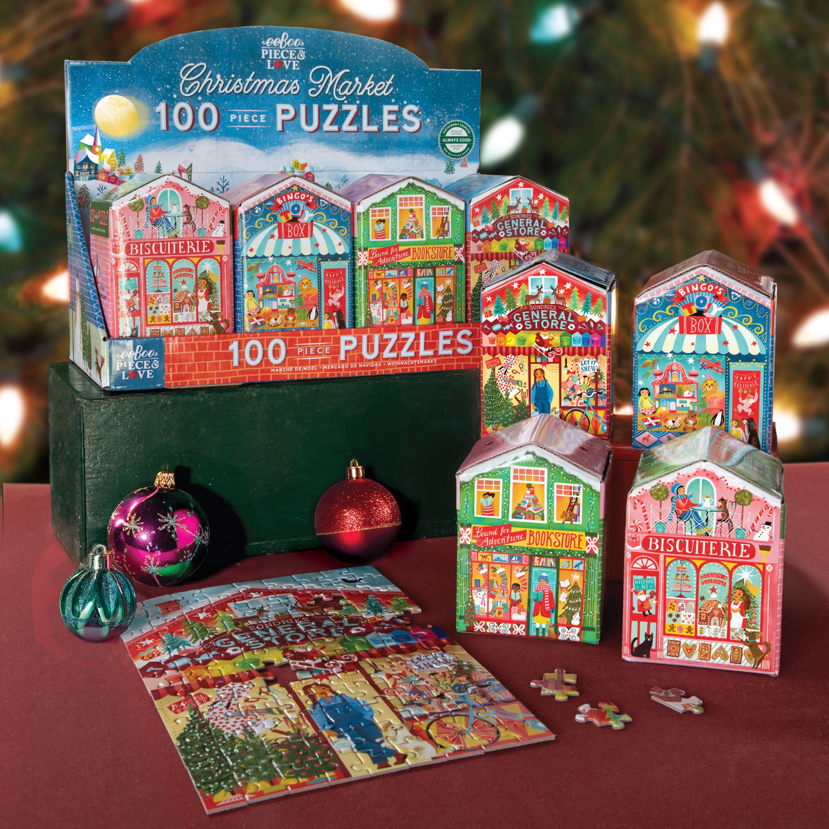 100pc Christmas Market Puzzle featuring festive village storefront boxes and a colorful holiday market scene