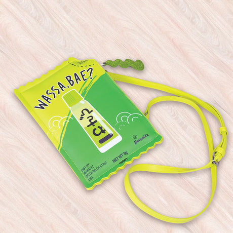 Crossbody Handbag | Wasabi shaped like a wasabi sauce packet with a bright yellow and green playful design.
