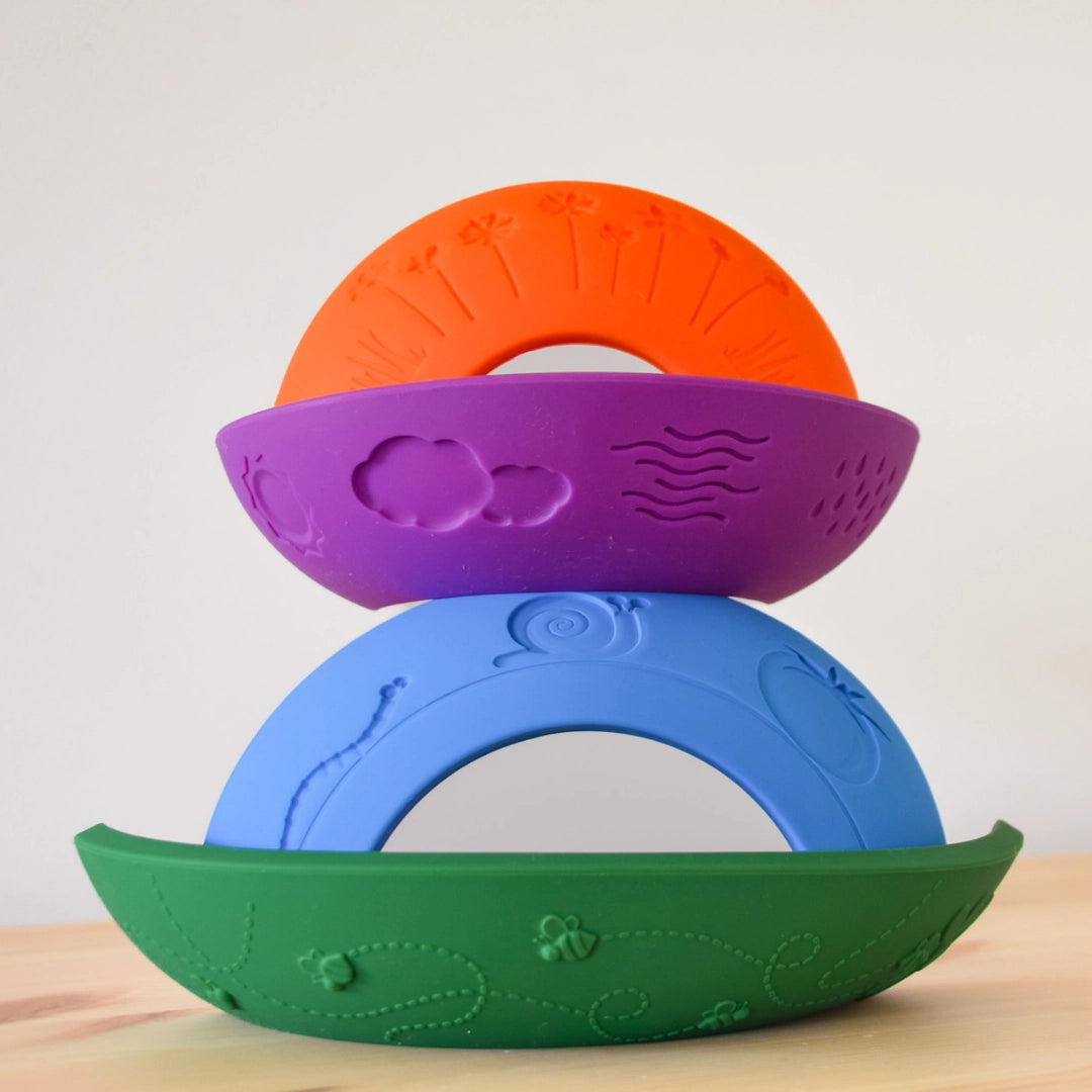 Over the Rainbow | Bright colorful silicone stacking arches with garden patterns for sensory and playdough fun.