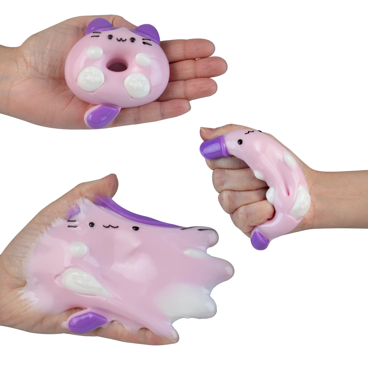 Hands holding and squishing a soft pink and purple cat-shaped squishy toy that looks like a donut.