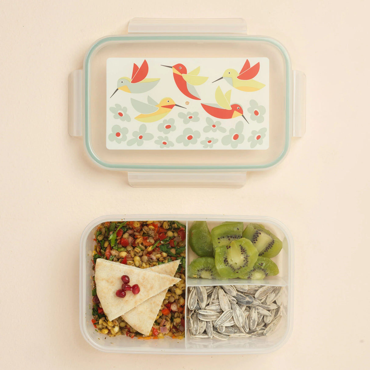 Good Lunch Bento Box | Hummingbird with colorful hummingbirds and three food compartments filled with healthy snacks.