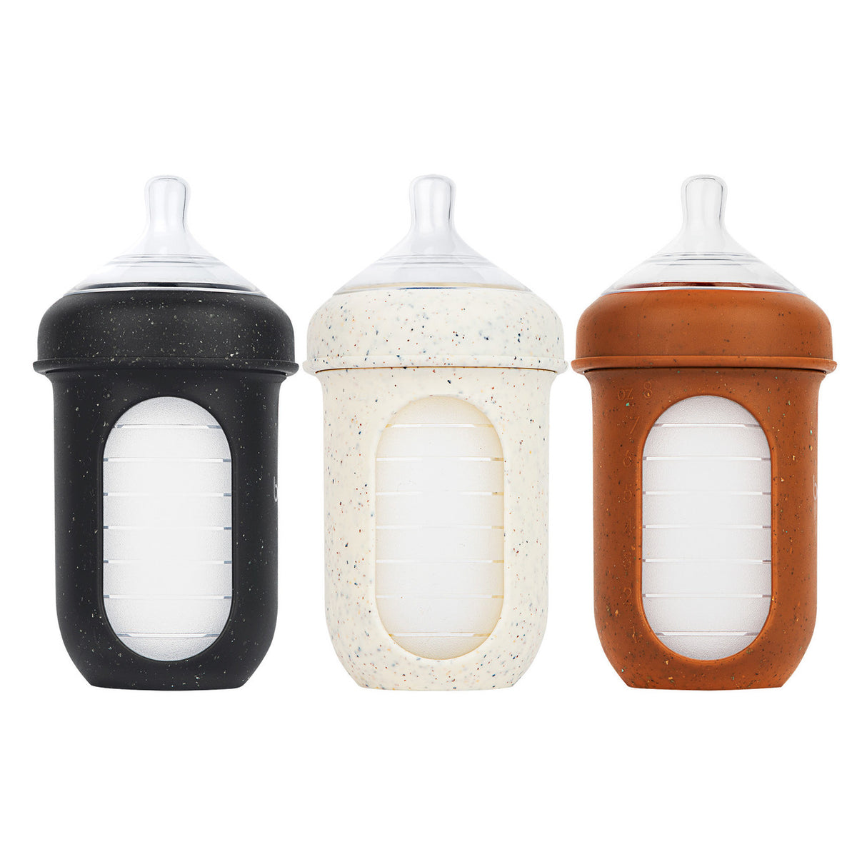 NURSH Silicone Bottles | Speckle in black, cream, and brown with collapsible silicone pouches to reduce colic.