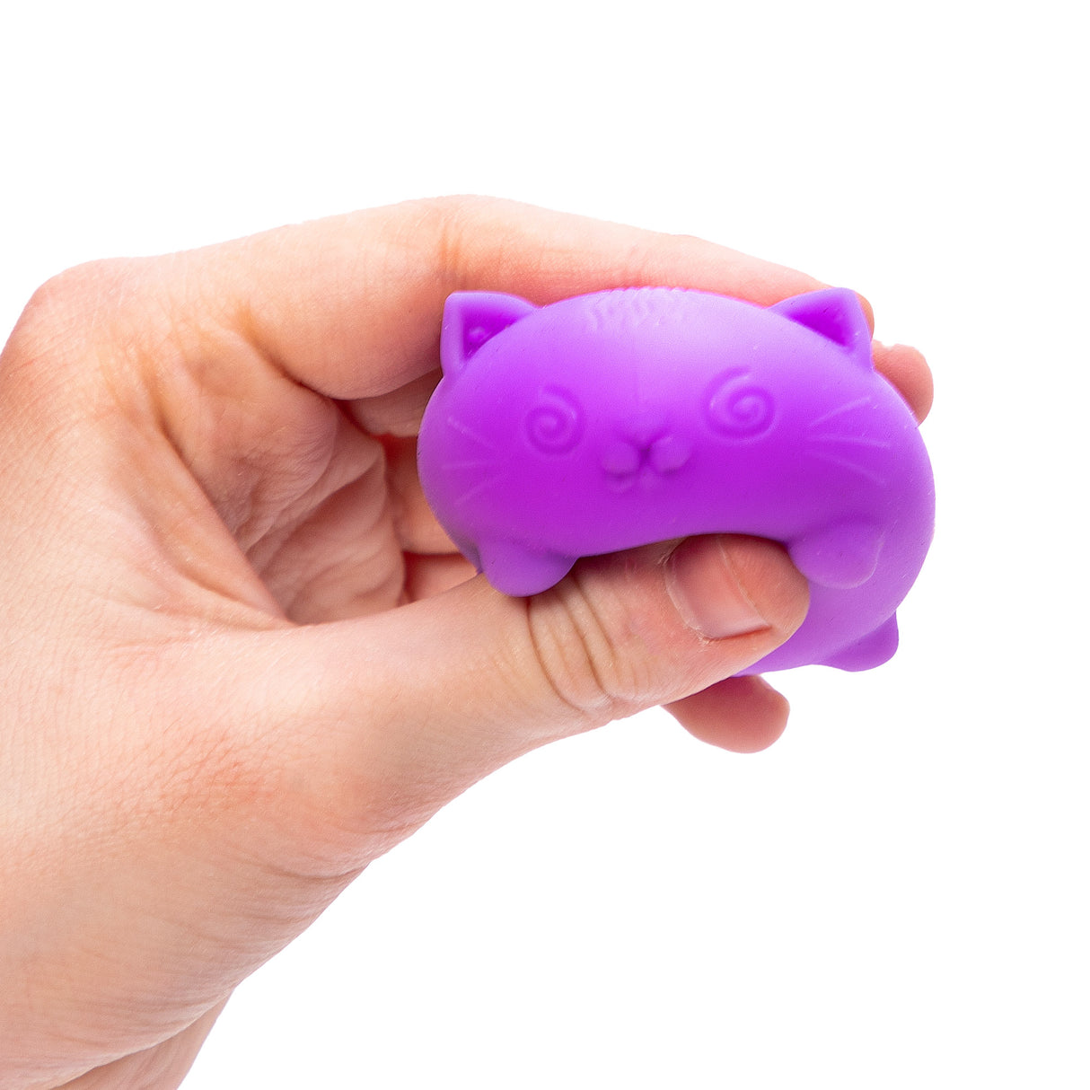 Hand squeezing a purple NeeDoh Teenie Cool Cats toy, showcasing its soft, dough-filled texture and playful design.