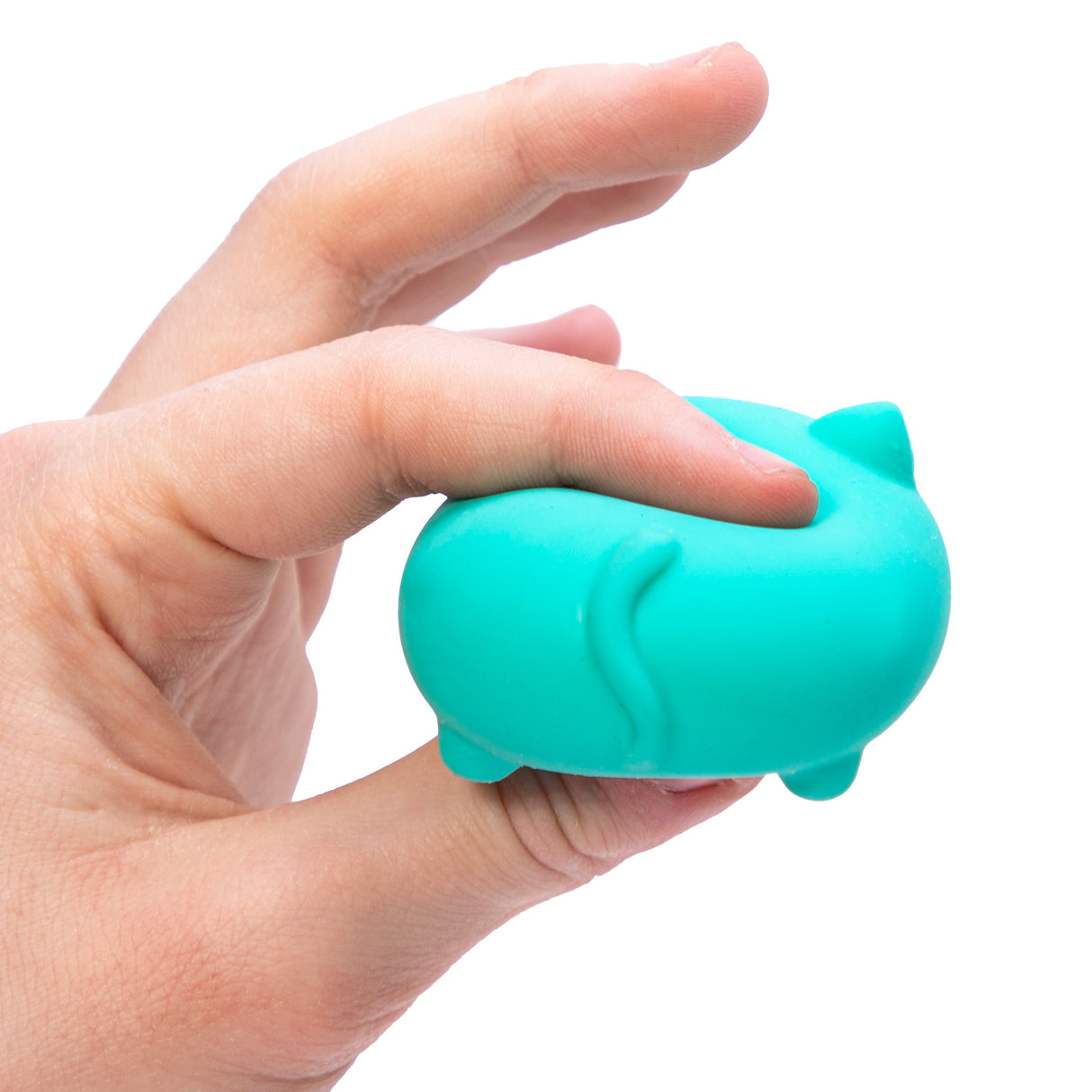 Hand squeezing a bright teal cat-shaped stress toy NeeDoh Teenie Cool Cats showing its stretchy, dough-filled texture.