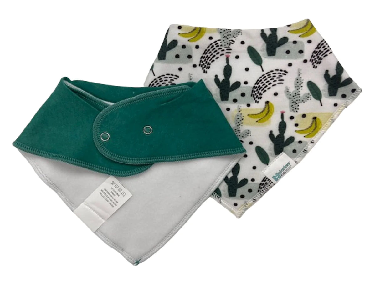 Dribble Bib | Cactus Banana featuring soft, absorbent fabric with adjustable snaps and a playful cactus and banana print.
