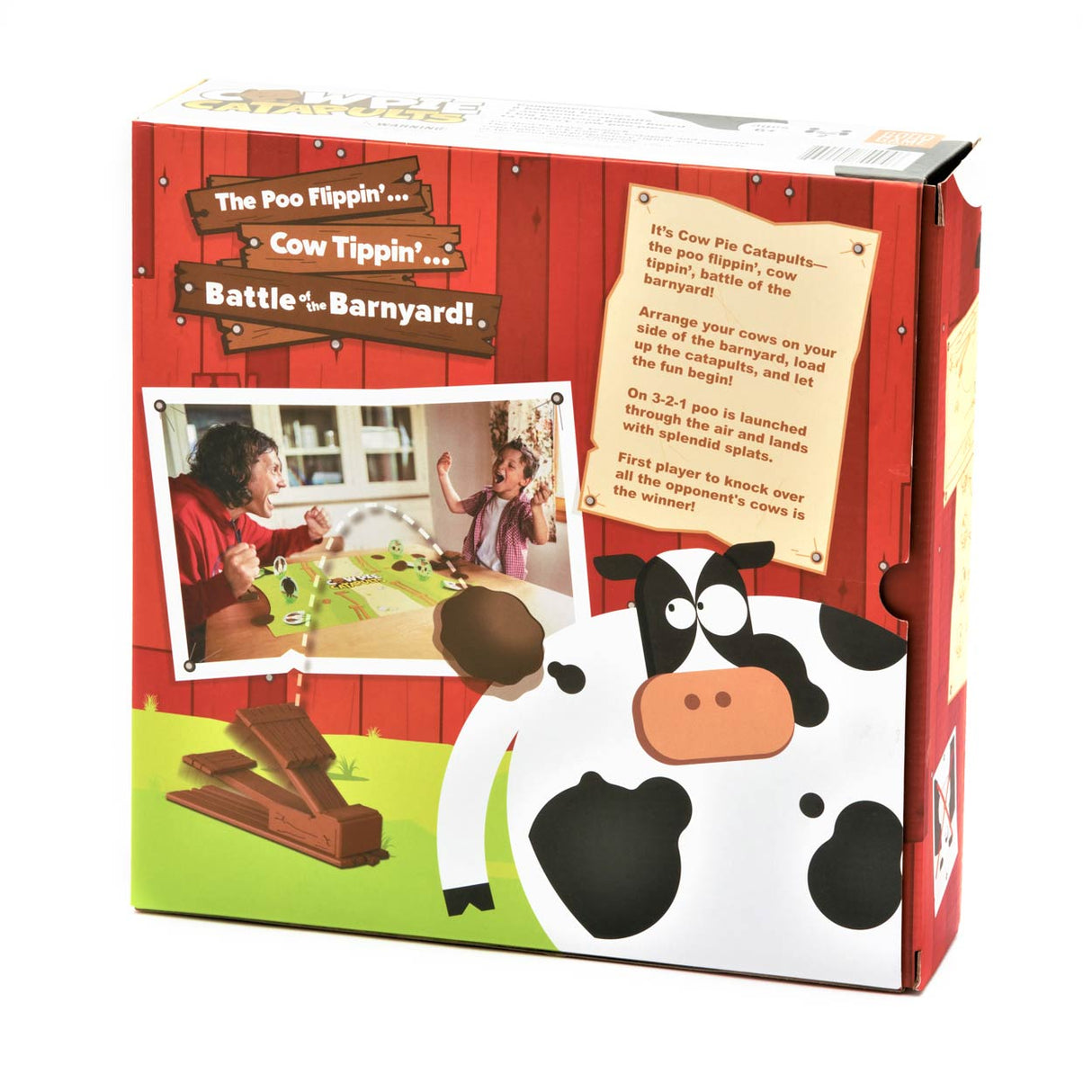 Cow Pie Catapults game box featuring barnyard, cows, catapults, and playful poo-flipping fun for kids and families.
