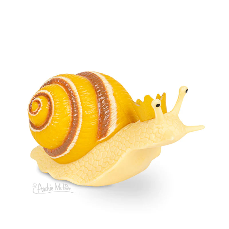 Crowned Critter soft vinyl snail with a yellow and brown shell wearing a small crown, colorful and detailed collectible.