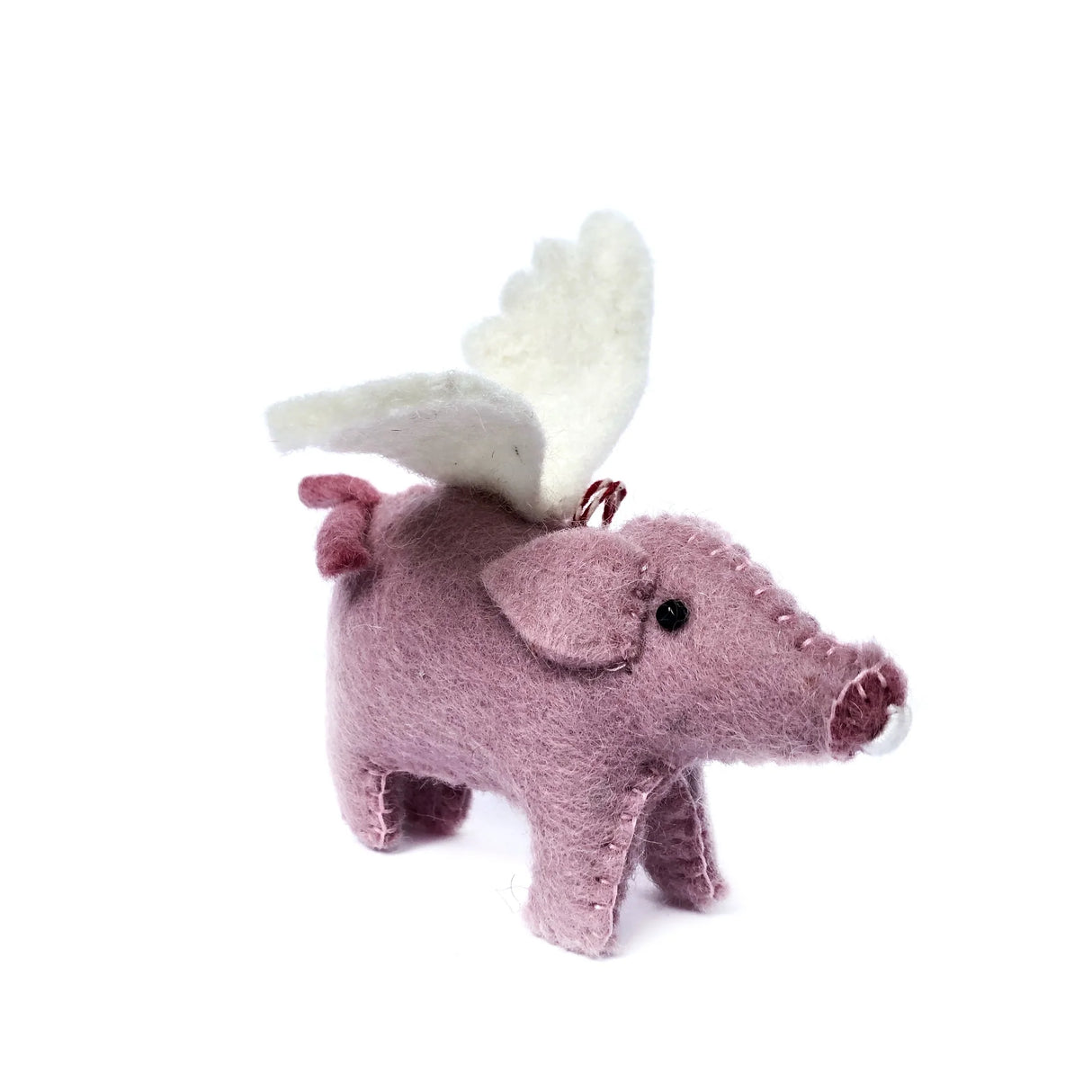 Flying Pig Felt Ornament handcrafted from colorful sheep wool with white wings, perfect for whimsical holiday decor.