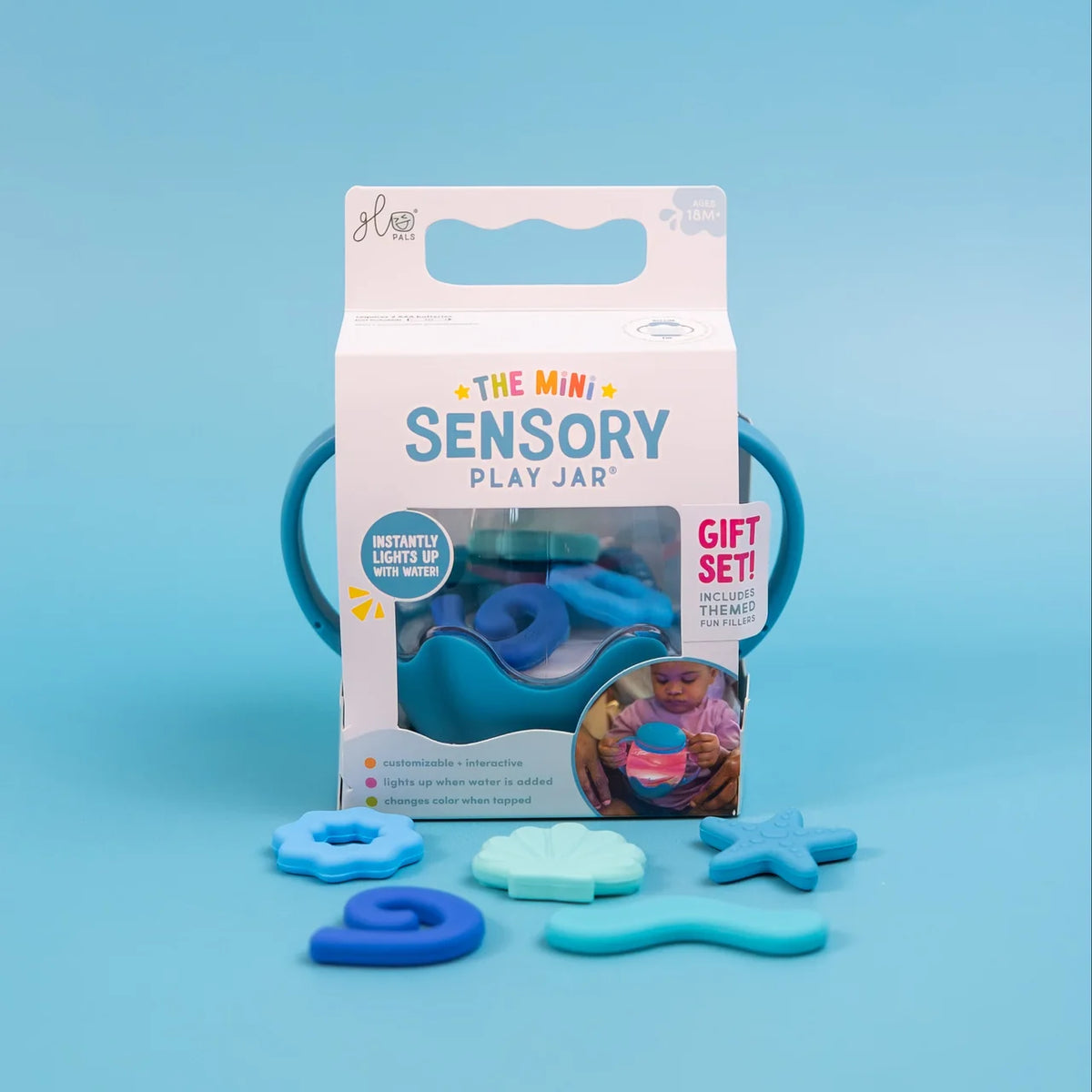 Mini Sensory Jar | Blue packaging with blue and aqua sensory pieces displayed in front