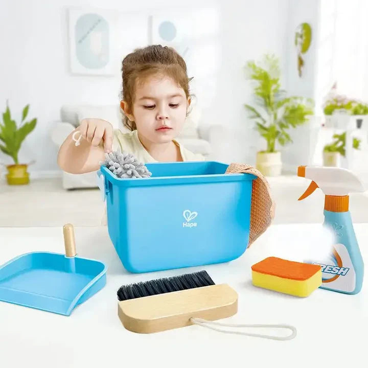 Child playing with Clean Up Bucket Set including bucket, spray, dustpan, brush, sponge, and duster for pretend cleaning.