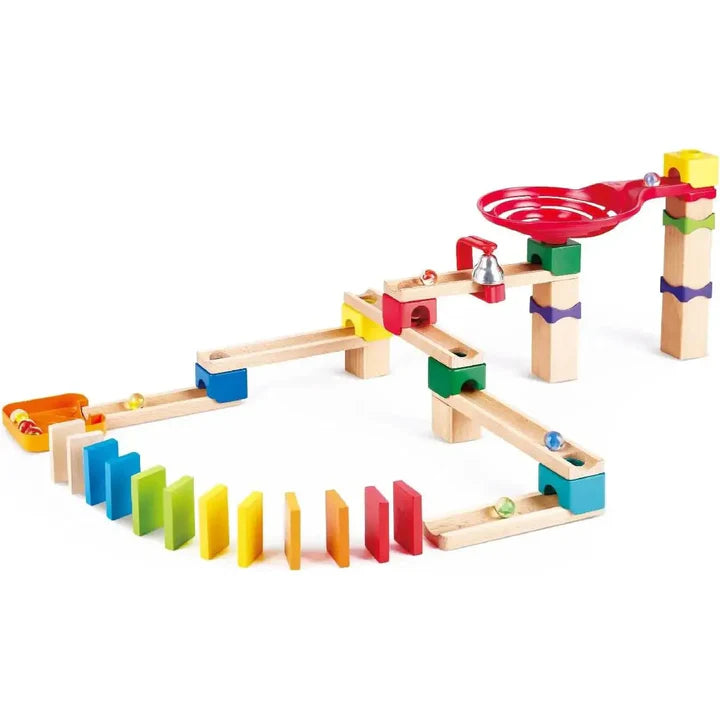 Wooden marble run toy with colorful blocks, tracks, ramps, and marbles set up for playful racing fun.
