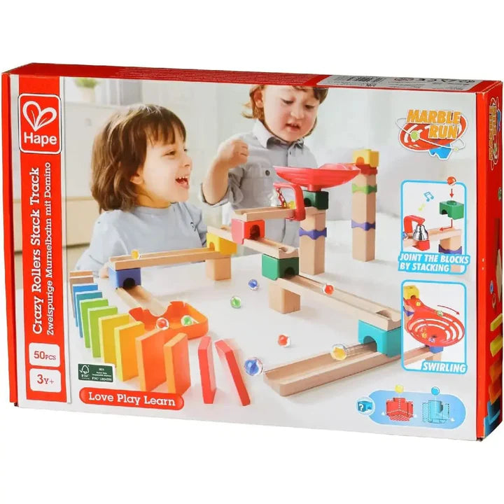 Children playing with colorful Crazy Rollers Stack Track Marble Run blocks and marbles on a white surface