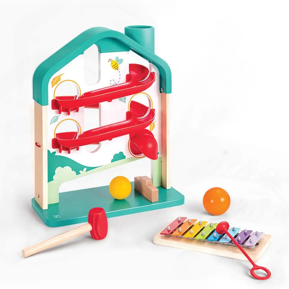 Melody Mansion Ball Run with colorful ball tracks, hammer, and rainbow xylophone for musical and rolling fun.