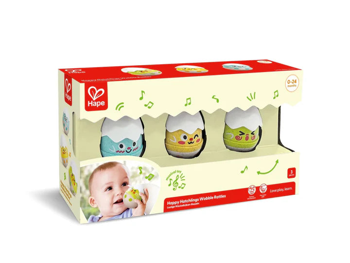 Set of three colorful baby rattles with playful faces designed to engage and entertain infants during playtime.