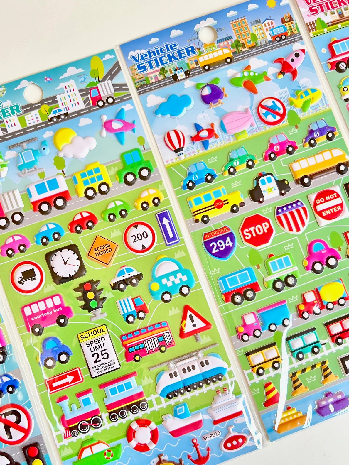 Cars Trucks & Trains Puffy Stickers featuring colorful vehicles, trains, planes, and road signs for creative fun.